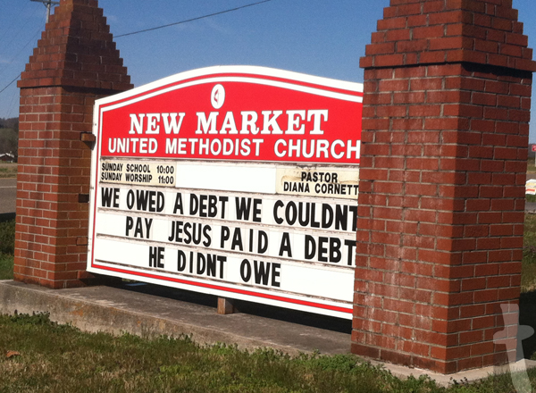 We owed a debt we couldn’t pay, Jesus paid a debt he didn’t owe – New Market United Methodist Church Sign